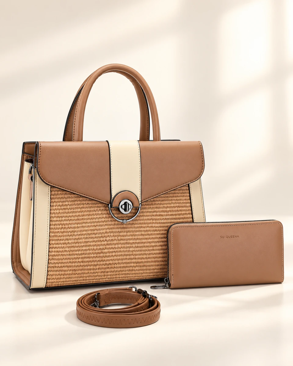 Model 2615, twin-handle bag shown in a front three-quarter view with a wallet and coiled shoulder strap.