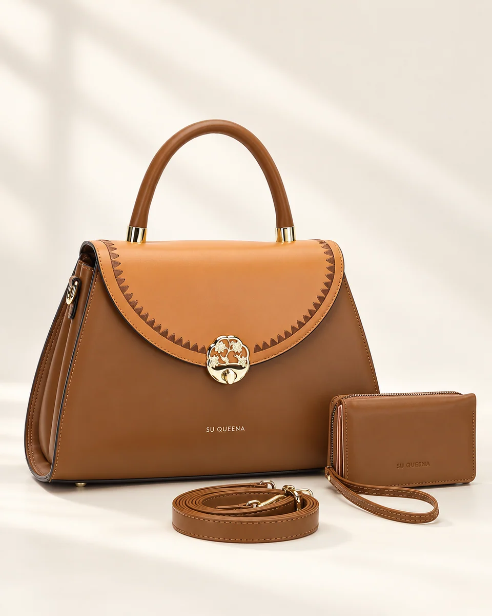 Model 3131, front three-quarter view with a rounded flap, decorative border, wallet and shoulder strap.