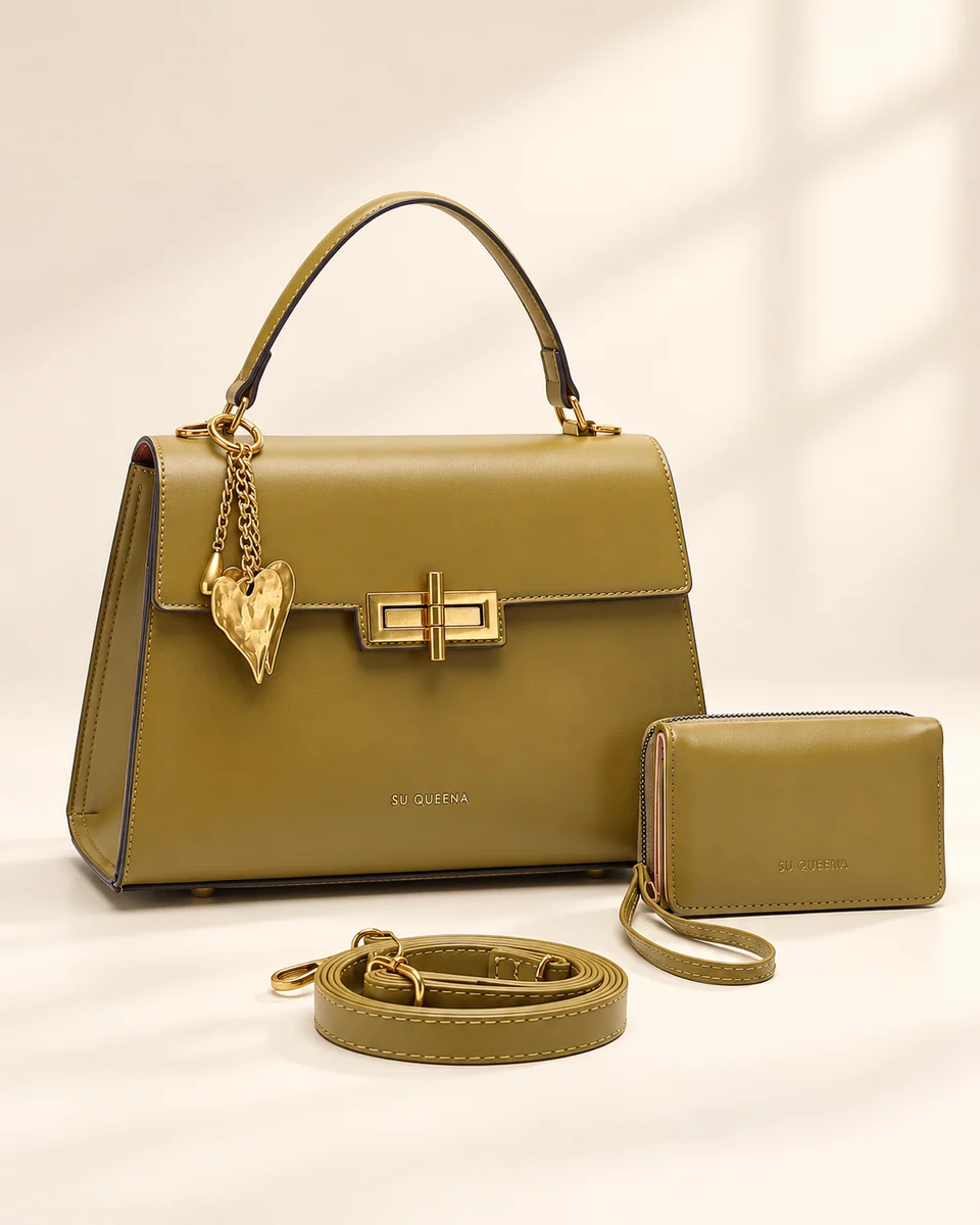 Model 3170, front three-quarter view with a rectangular clasp, hanging heart charm, wallet and shoulder strap.